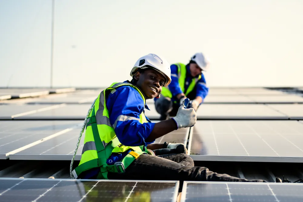 maintenance technicians installing solar panels
